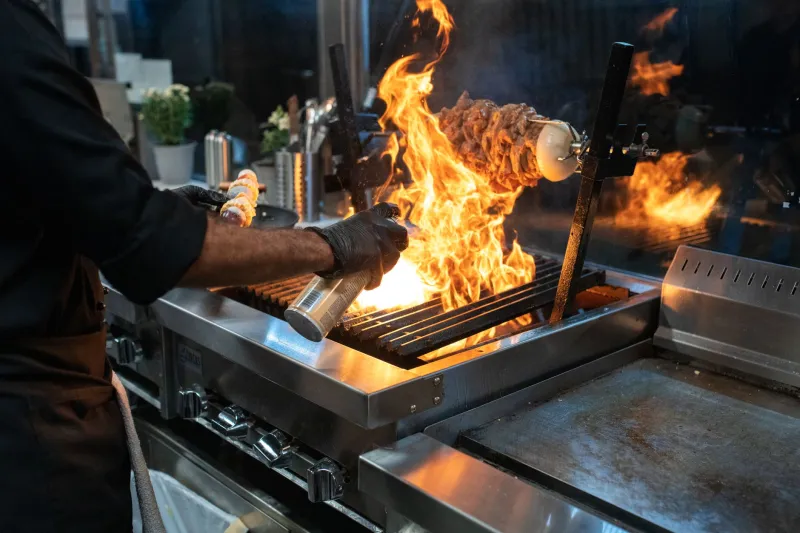 Burning Bridges with the Burner: How America's Top Restaurants Are Trading Gas for Glowing Coals